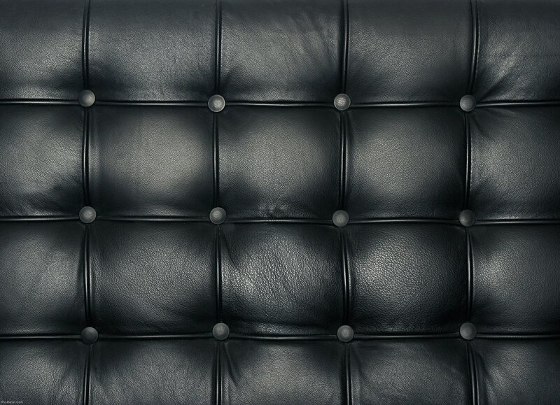 black leather tufted upholstery