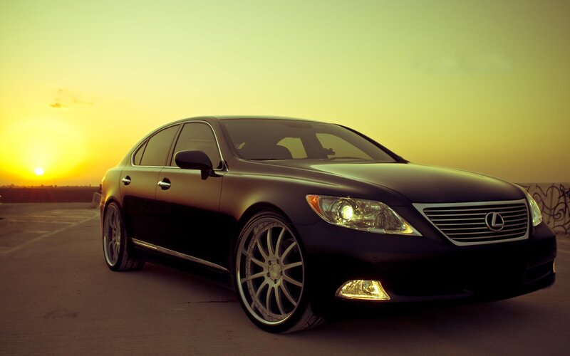 Black Lexus at sunset