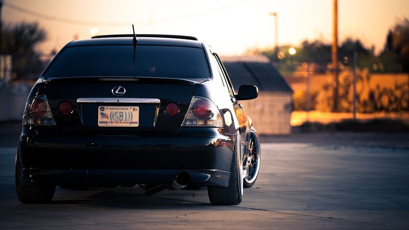 black lexus at sunset