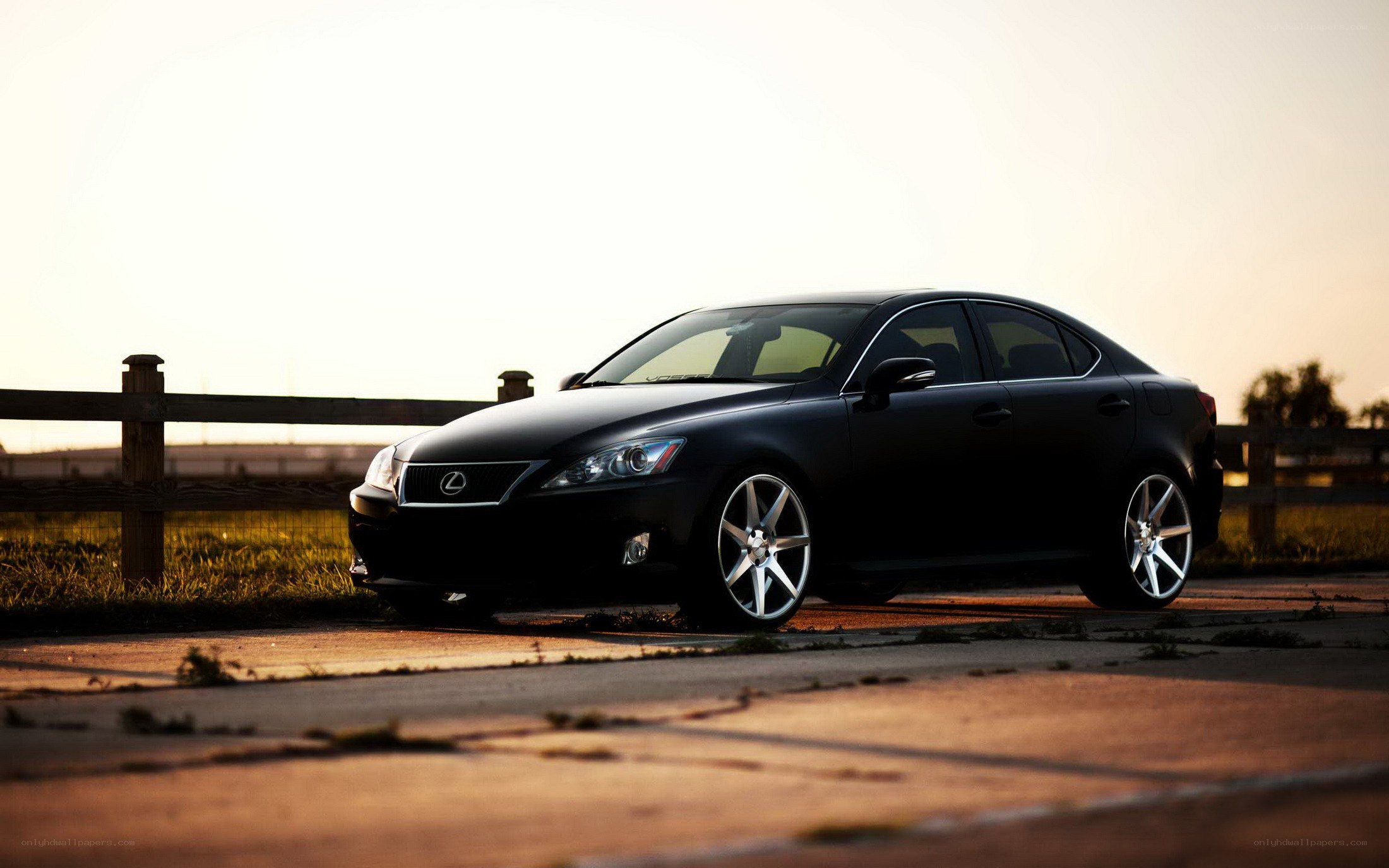 black lexus at sunset