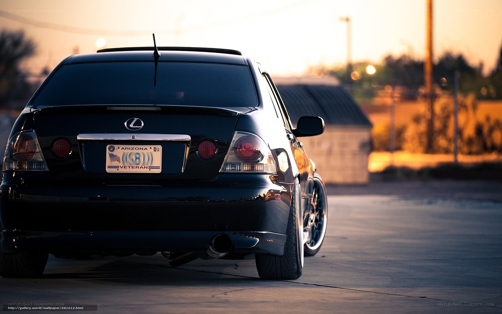 Black Lexus at sunset