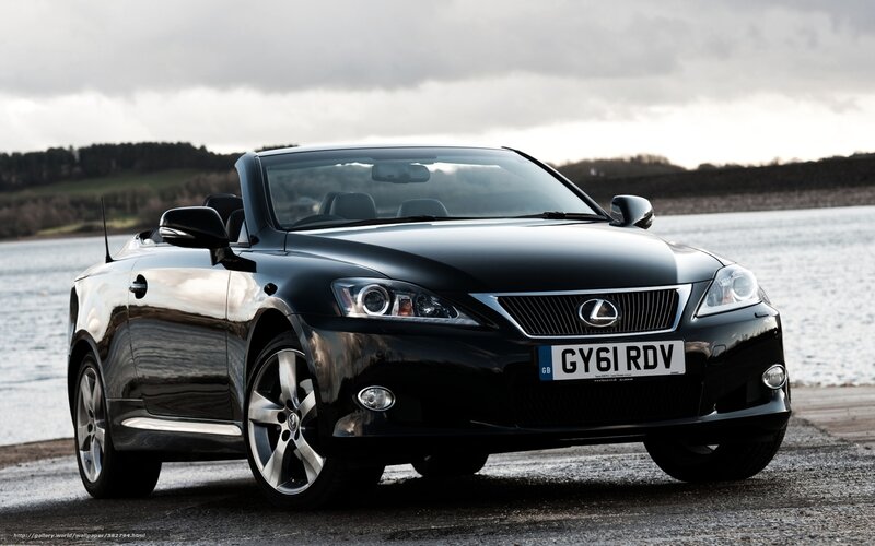 Black Lexus convertible by water