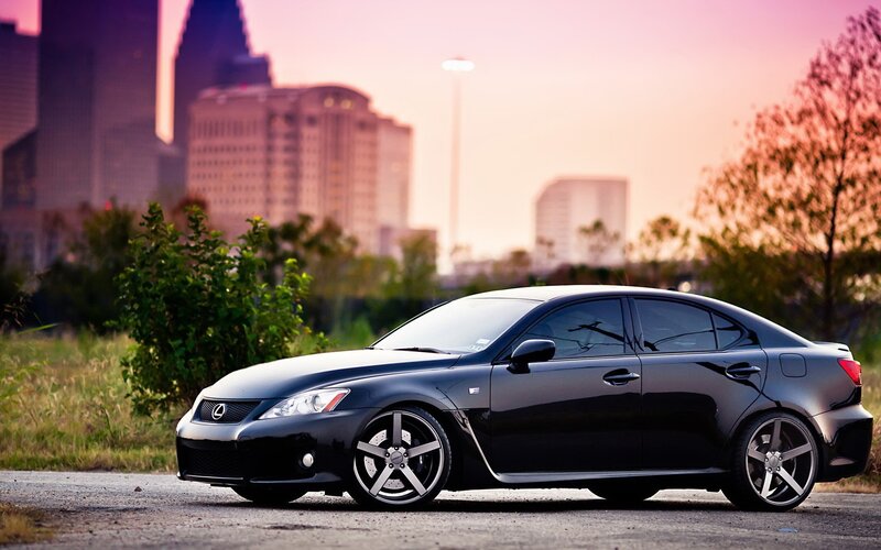 black lexus in cityscape