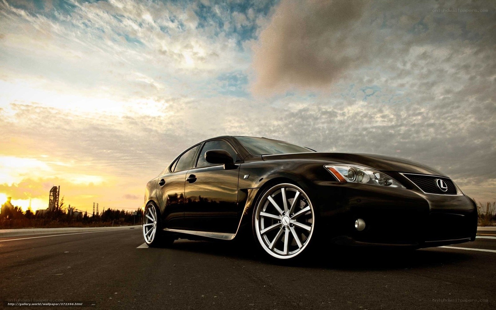 Black Lexus IS at sunset