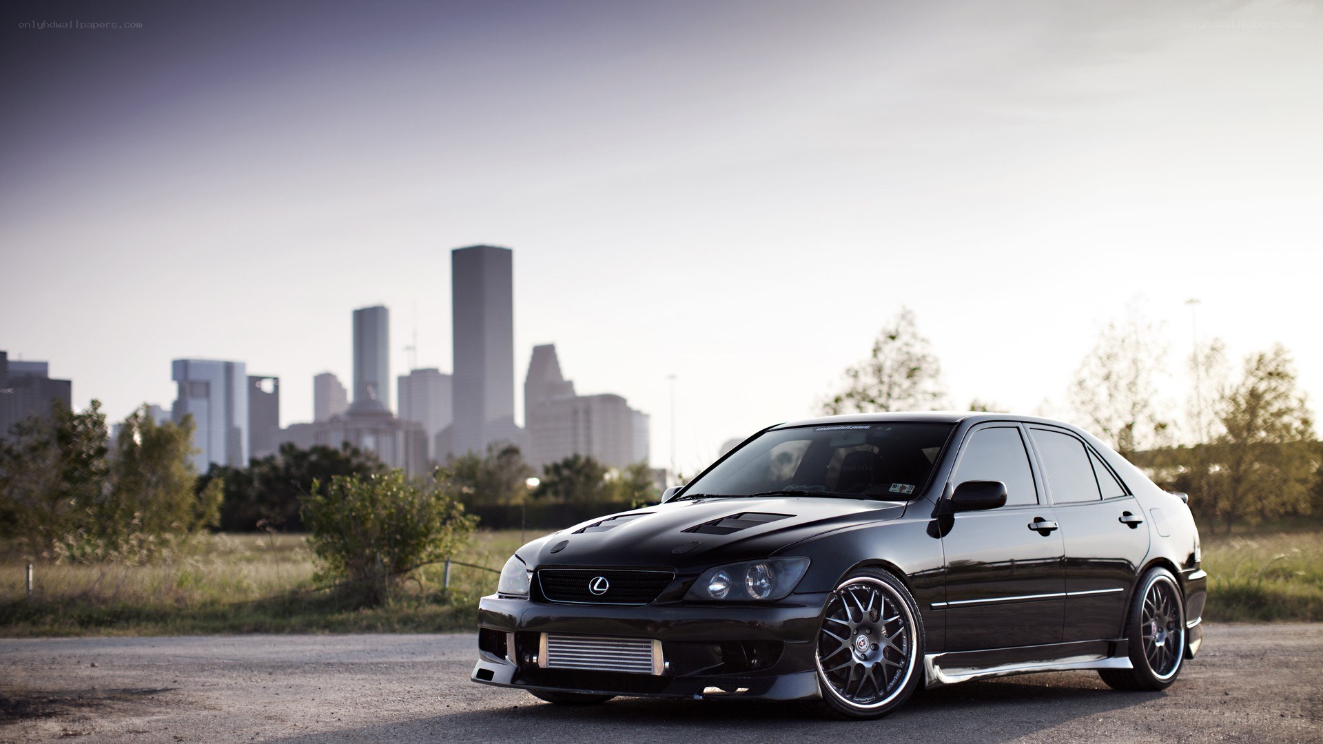 black lexus is200t in city