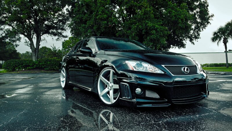 black lexus is250 on wet pavement