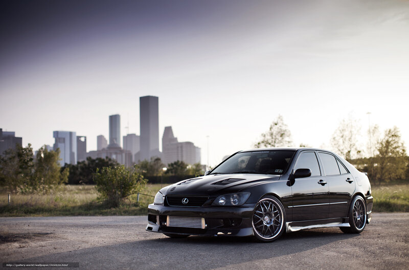 Black Lexus IS300 in cityscape