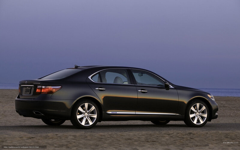 Black Lexus LS 600h on beach
