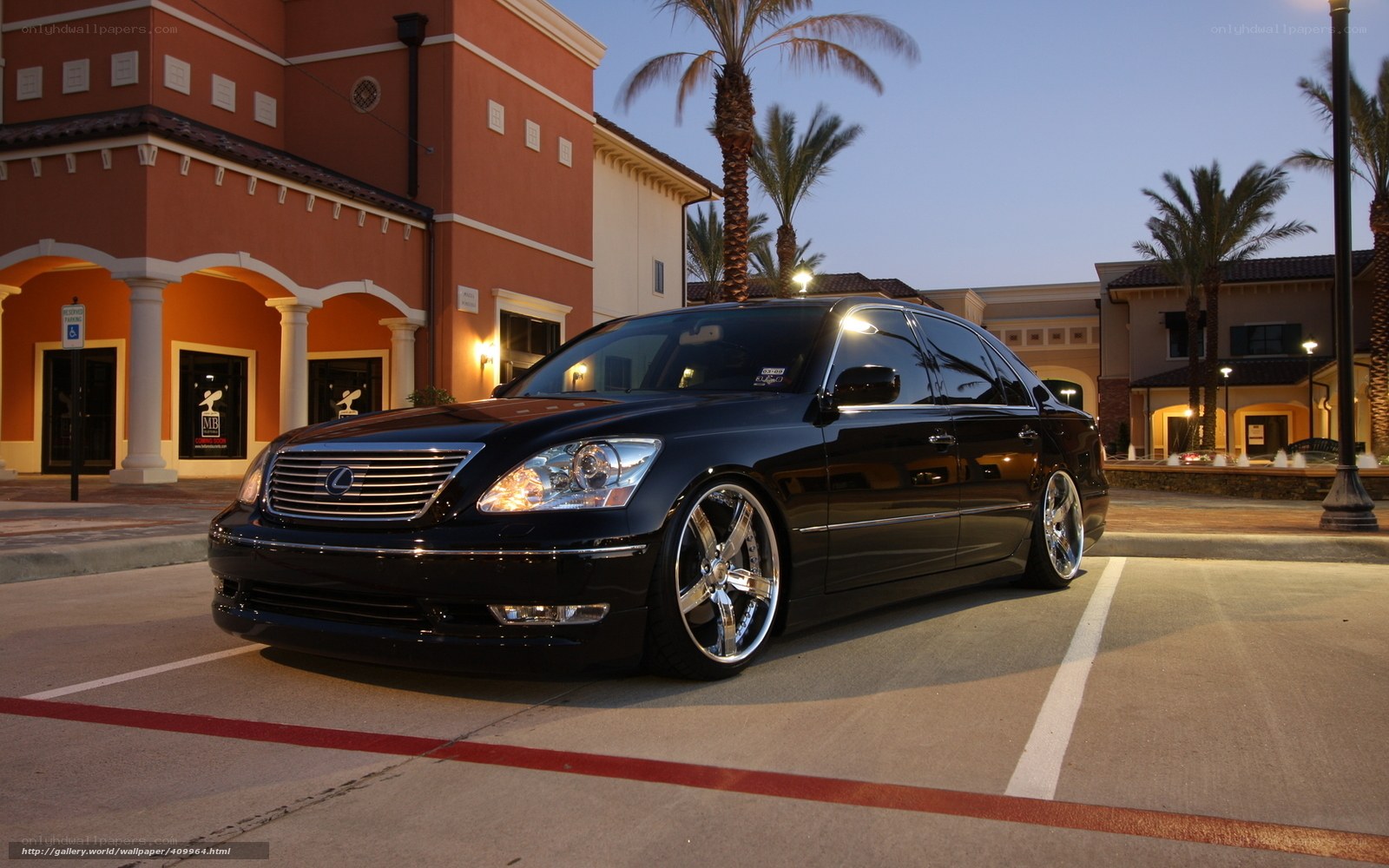 Black Lexus LS430 in parking lot