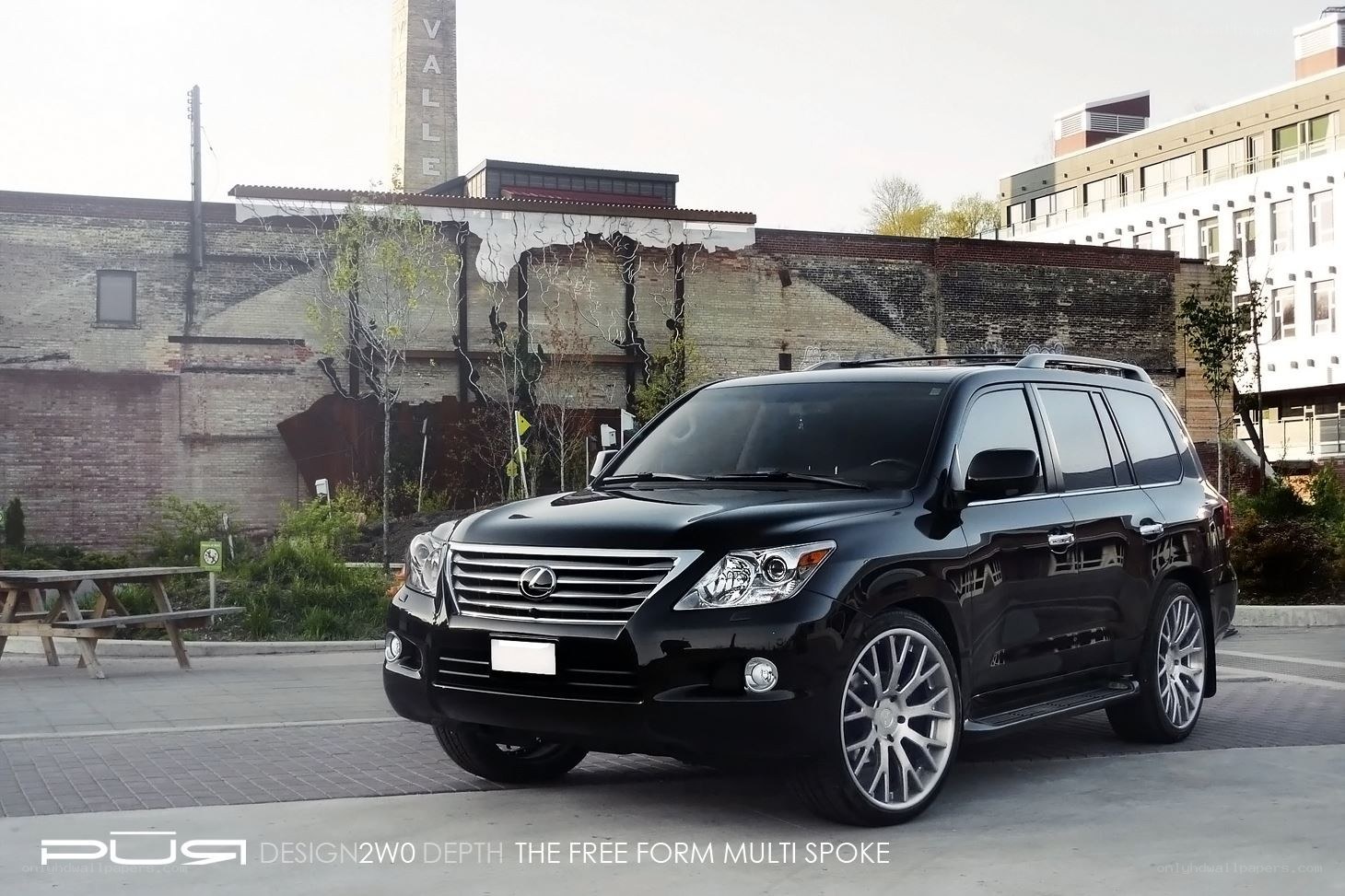 Black Lexus LX with custom wheels