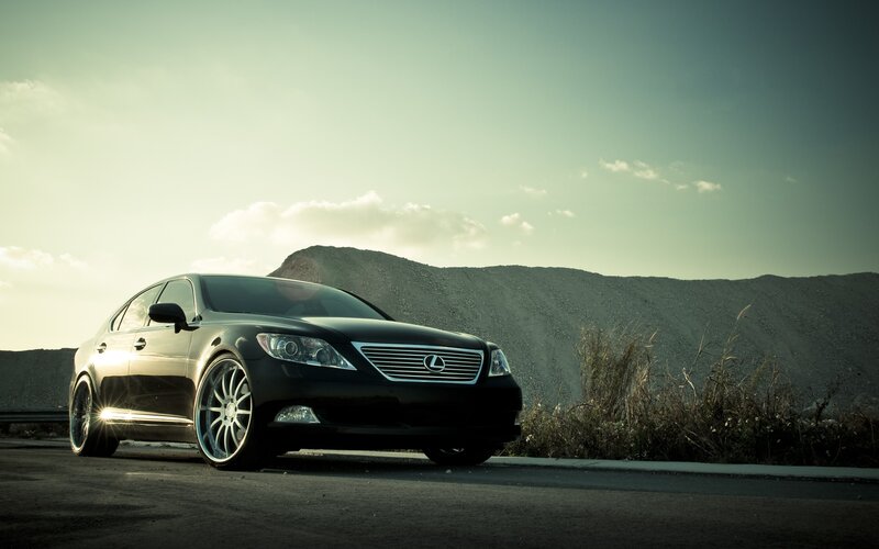 Black Lexus on a road