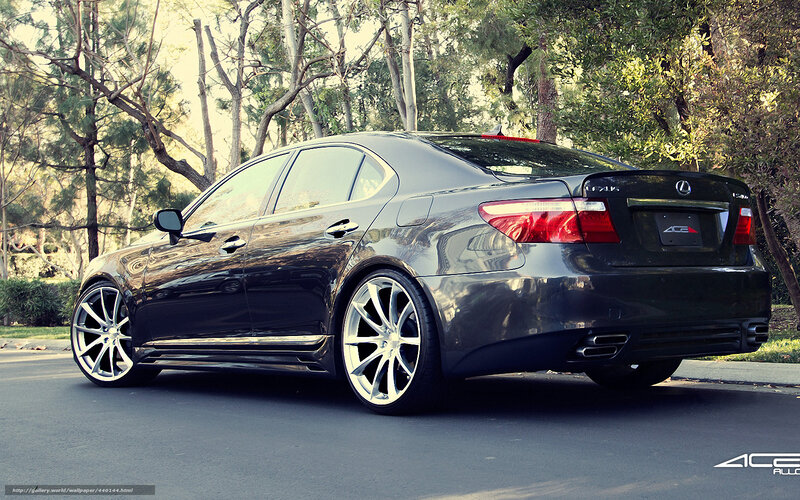Black Lexus sedan on a street