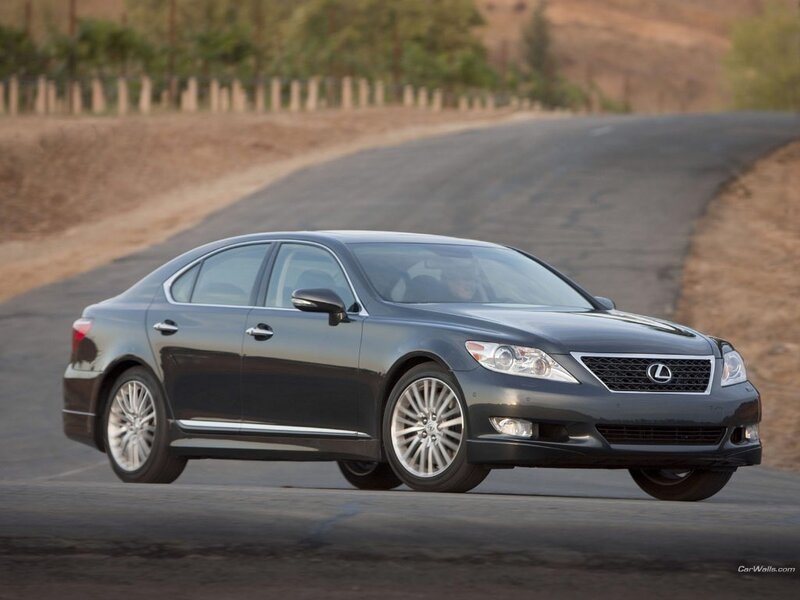 black lexus sedan on road
