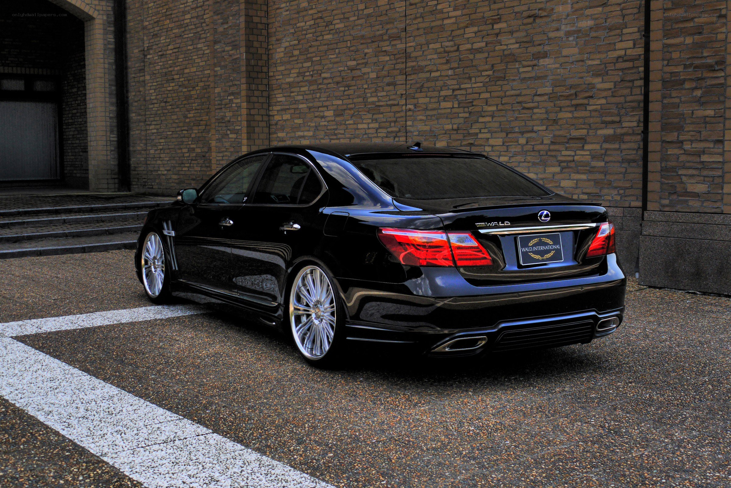 Black Lexus sedan parked