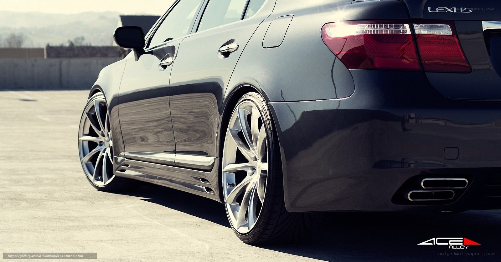 black lexus sedan with alloy wheels