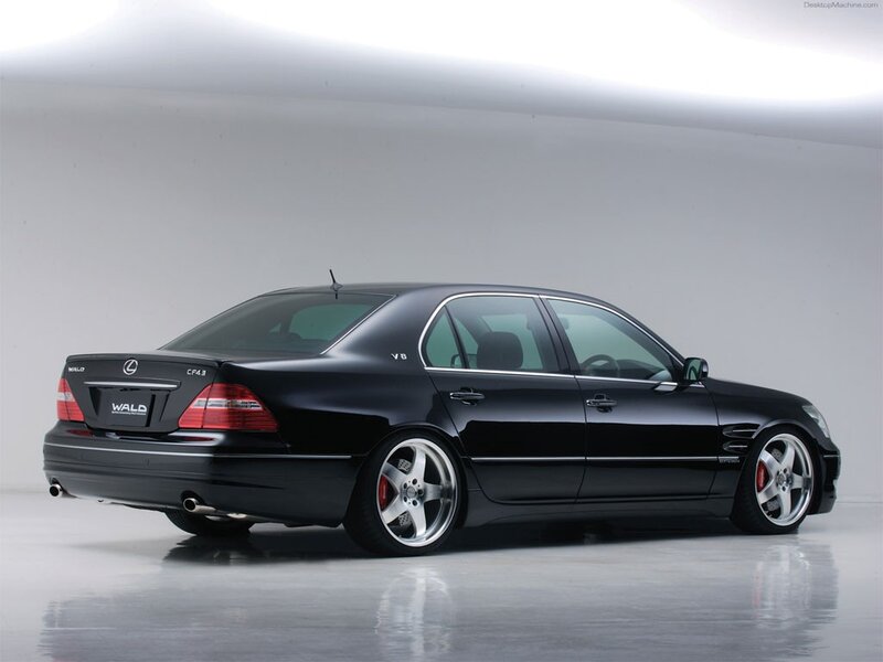 black lexus sedan with custom wheels