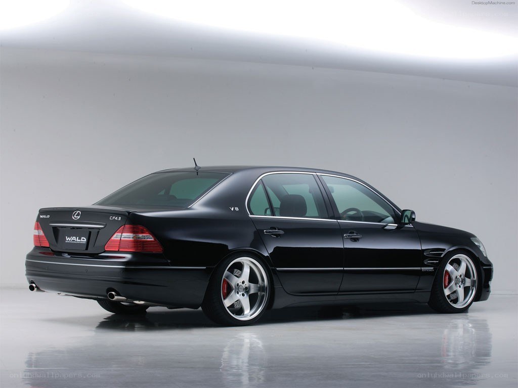 black lexus sedan with custom wheels