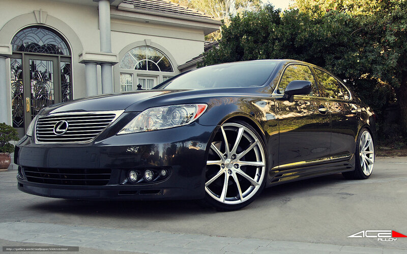 black lexus sedan with custom wheels