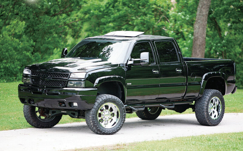 Black Lifted Pickup Truck — Calm, Afternoon