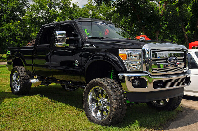 Black Lifted Pickup Truck — Outdoor, Afternoon