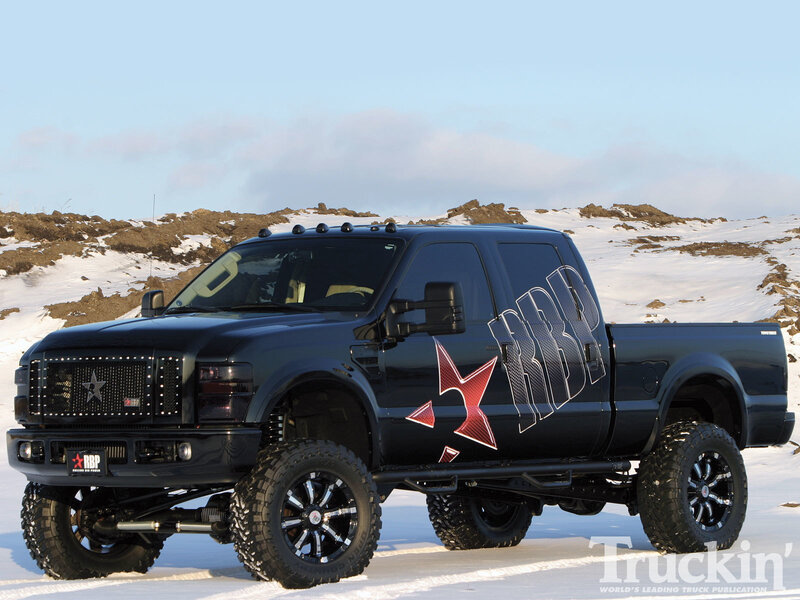 Black Lifted Truck — Dramatic, Winter