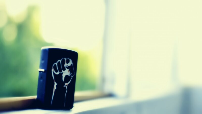 Black Lighter with Fist Design