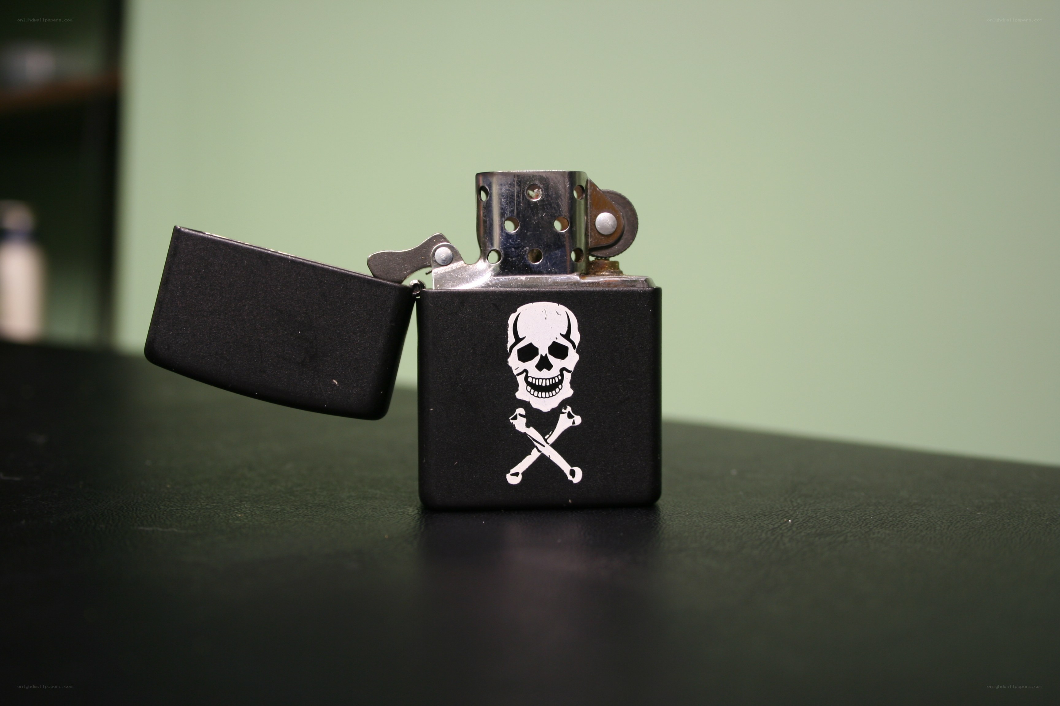 black lighter with skull design
