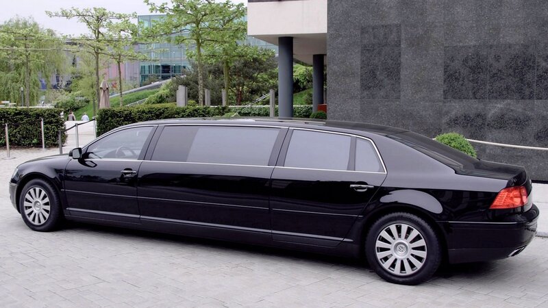 black limousine parked outside building