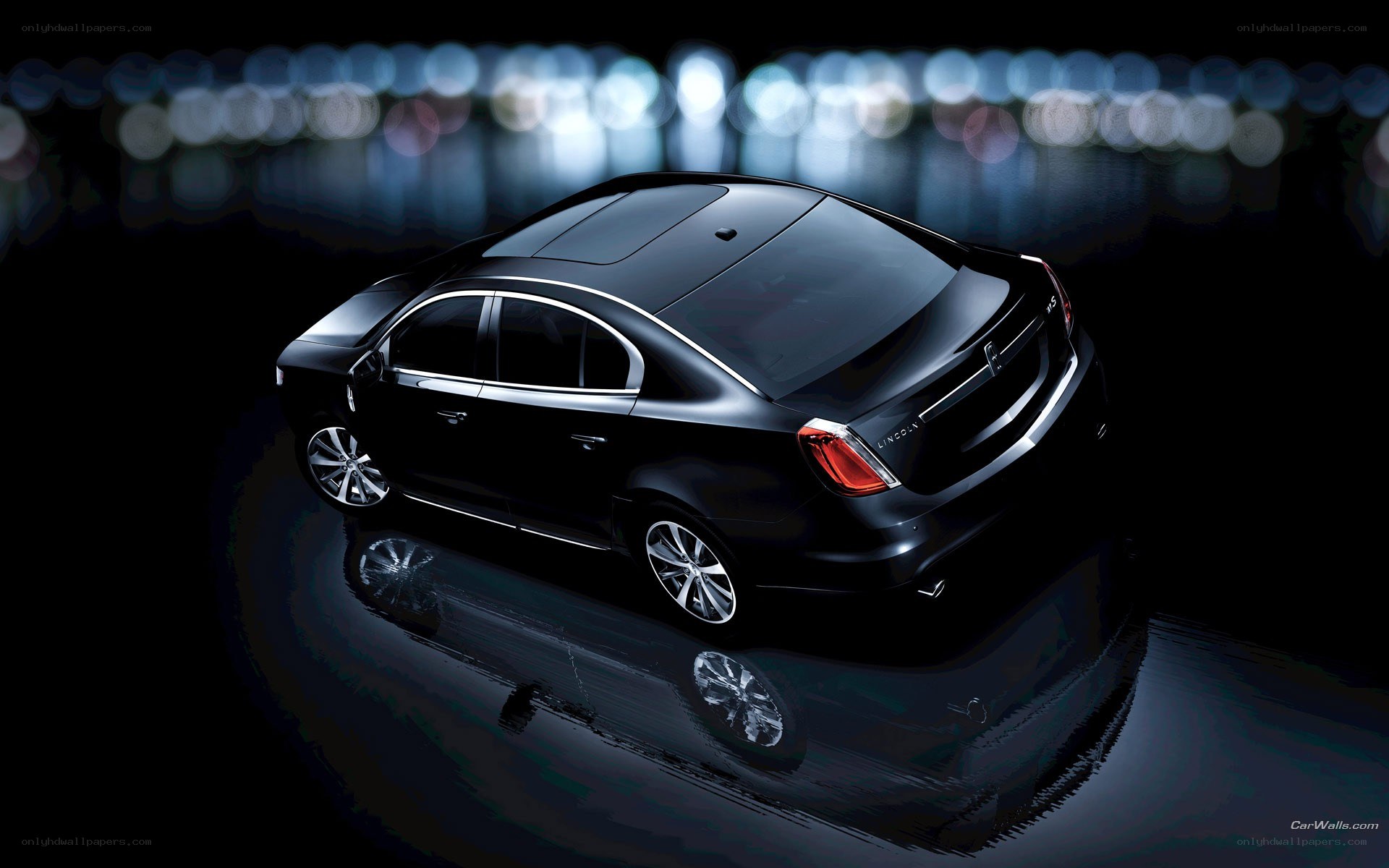 Black Lincoln sedan at night