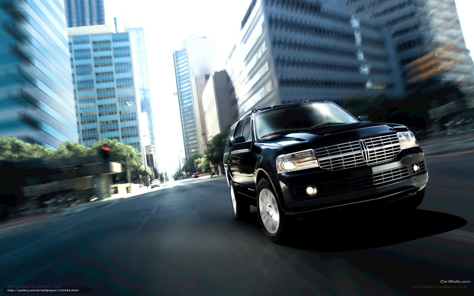 Black Lincoln SUV in city