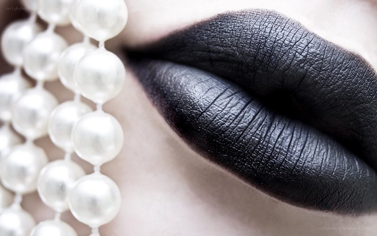 black lips with pearl necklace