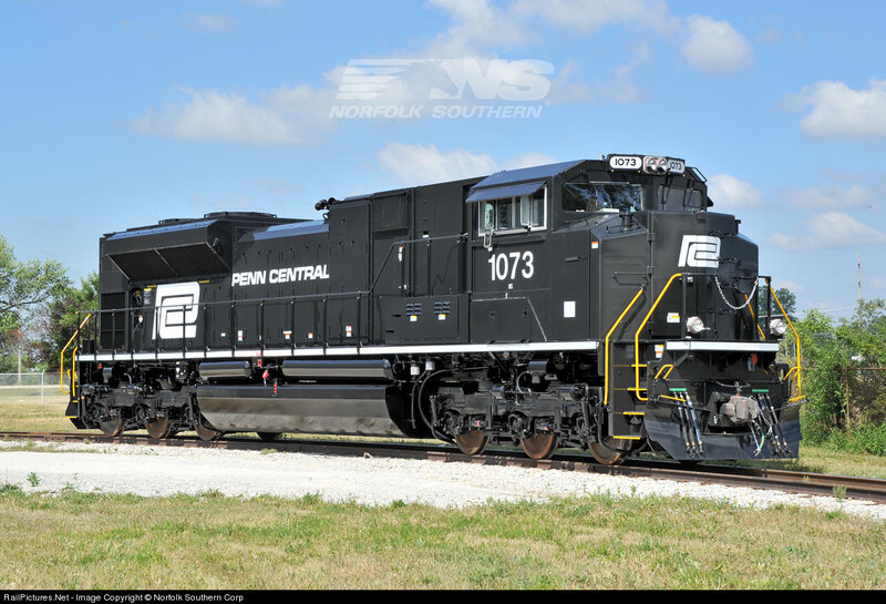 Black Locomotive on Tracks — Calm