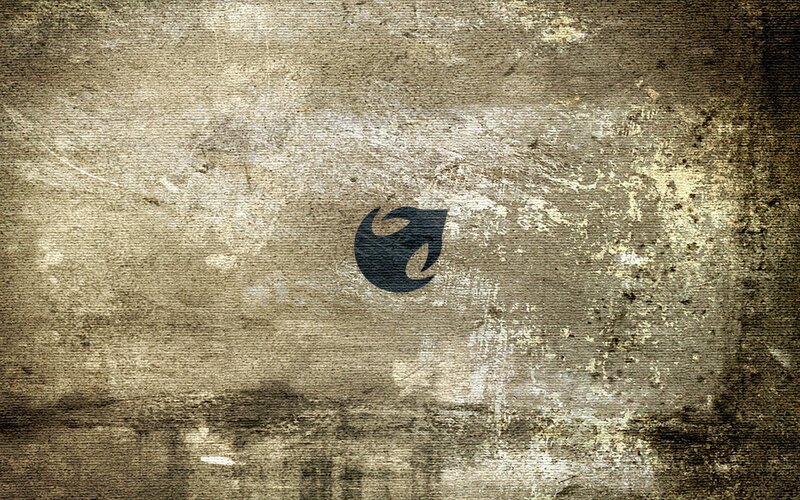 Black Logo on Textured Surface — Brown