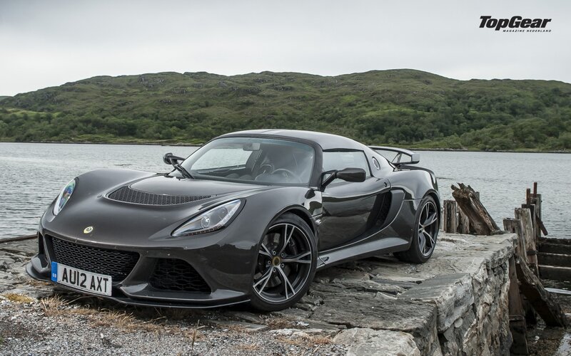 Black Lotus Exige on a stone pier