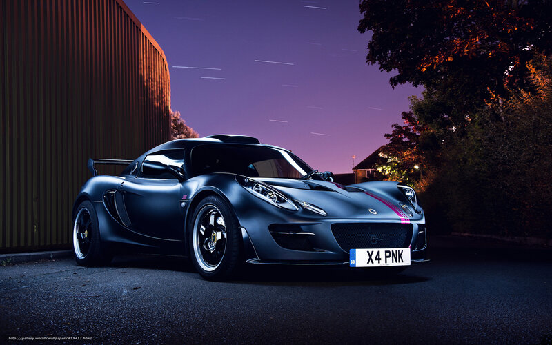 Black Lotus sports car at night