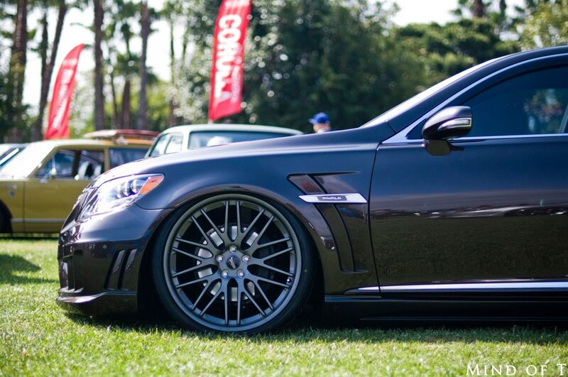 Black luxury car at a show