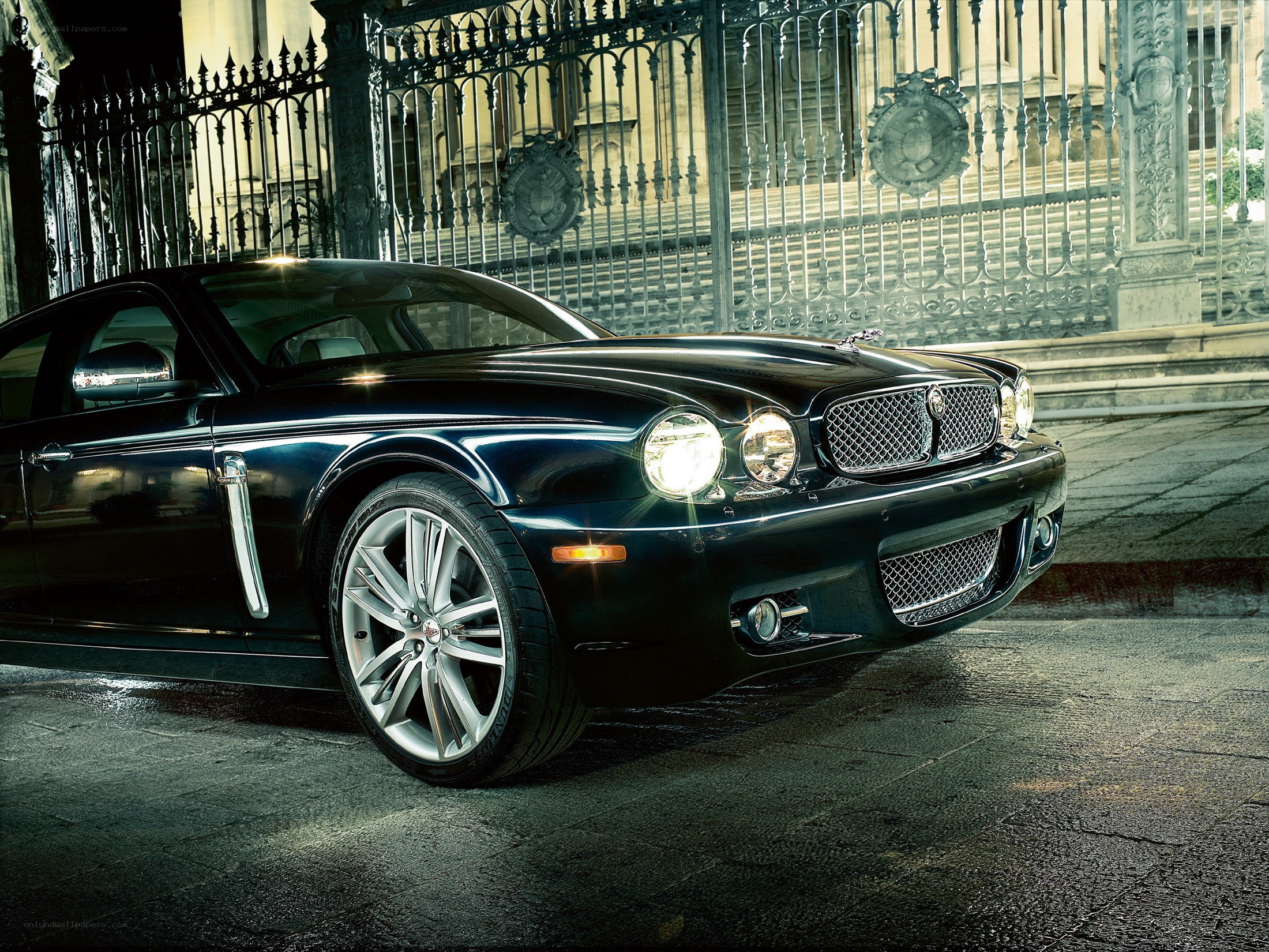 Black luxury car at night