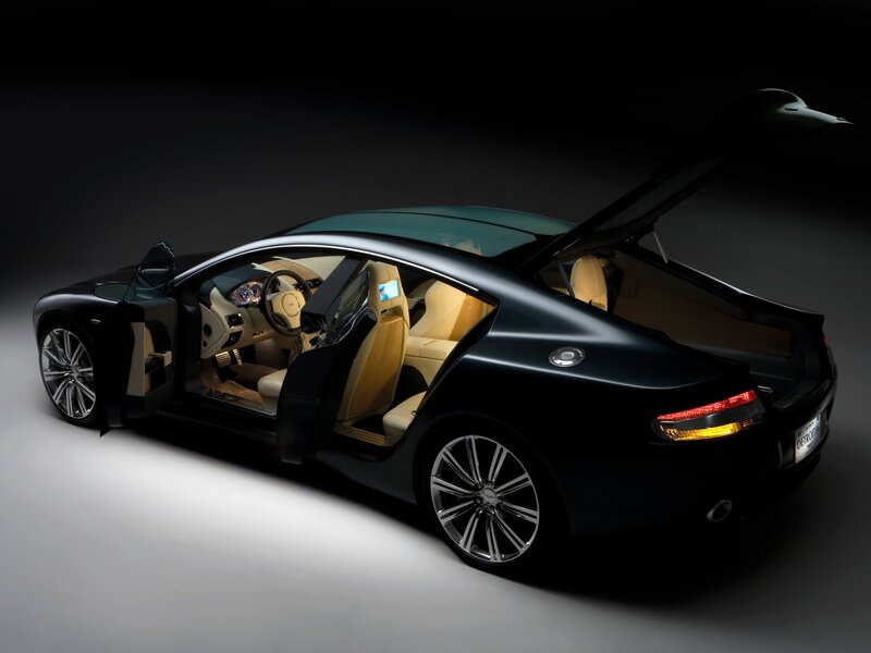 Black luxury car with open doors
