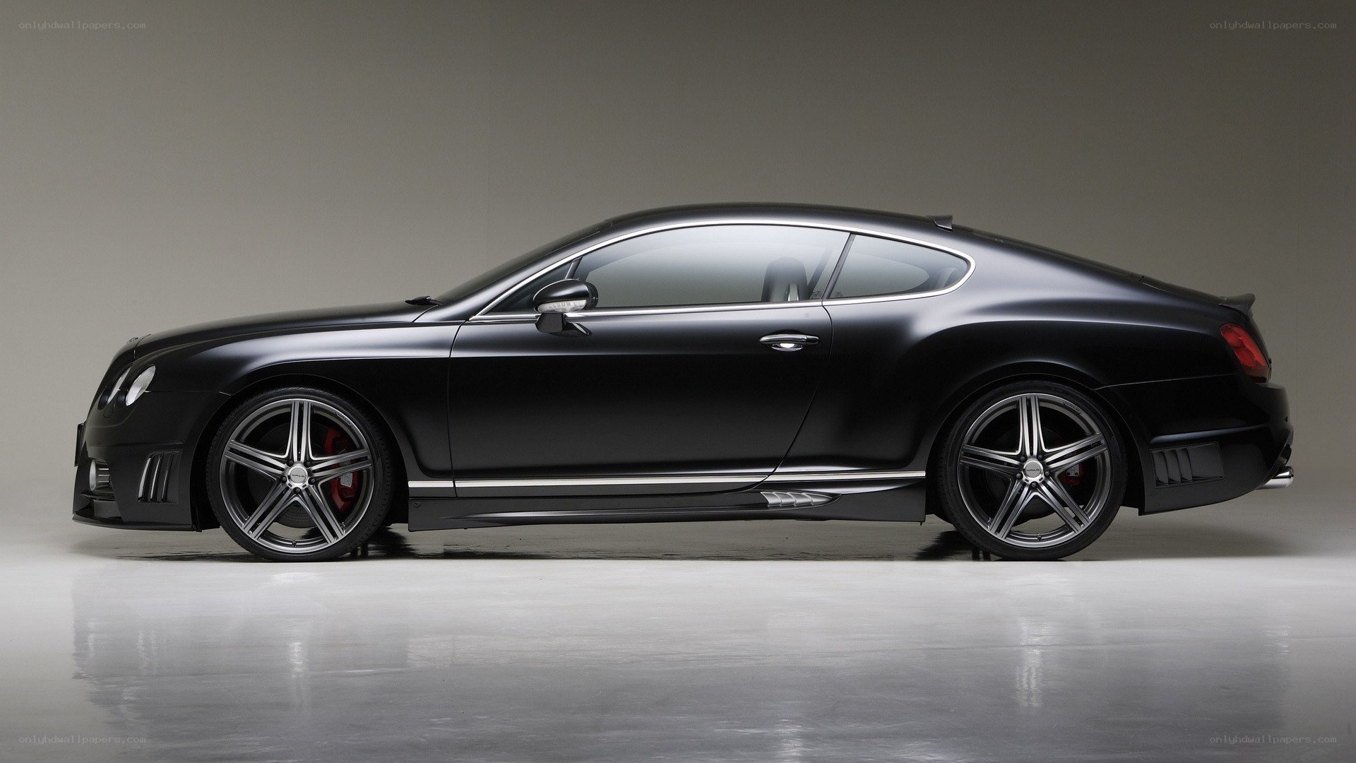 black luxury coupe side profile