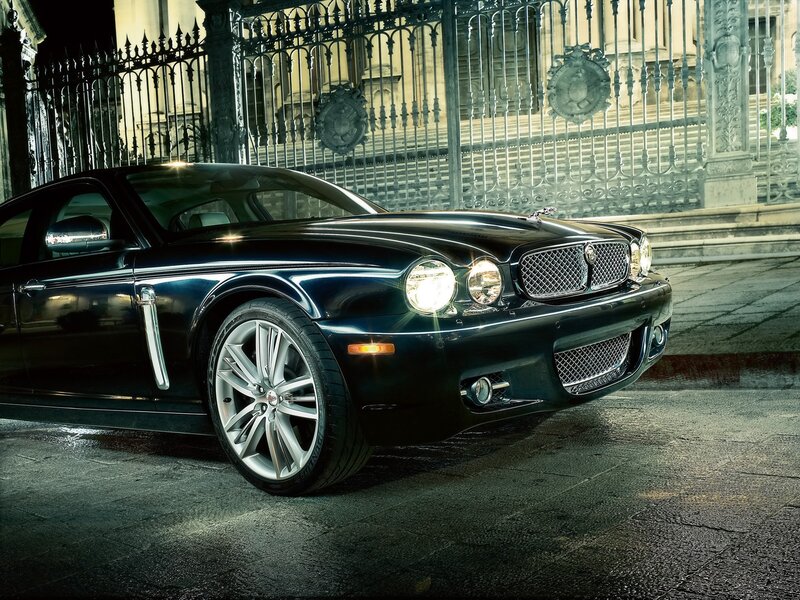 Black Luxury Sedan — Dramatic, Night, Photograph