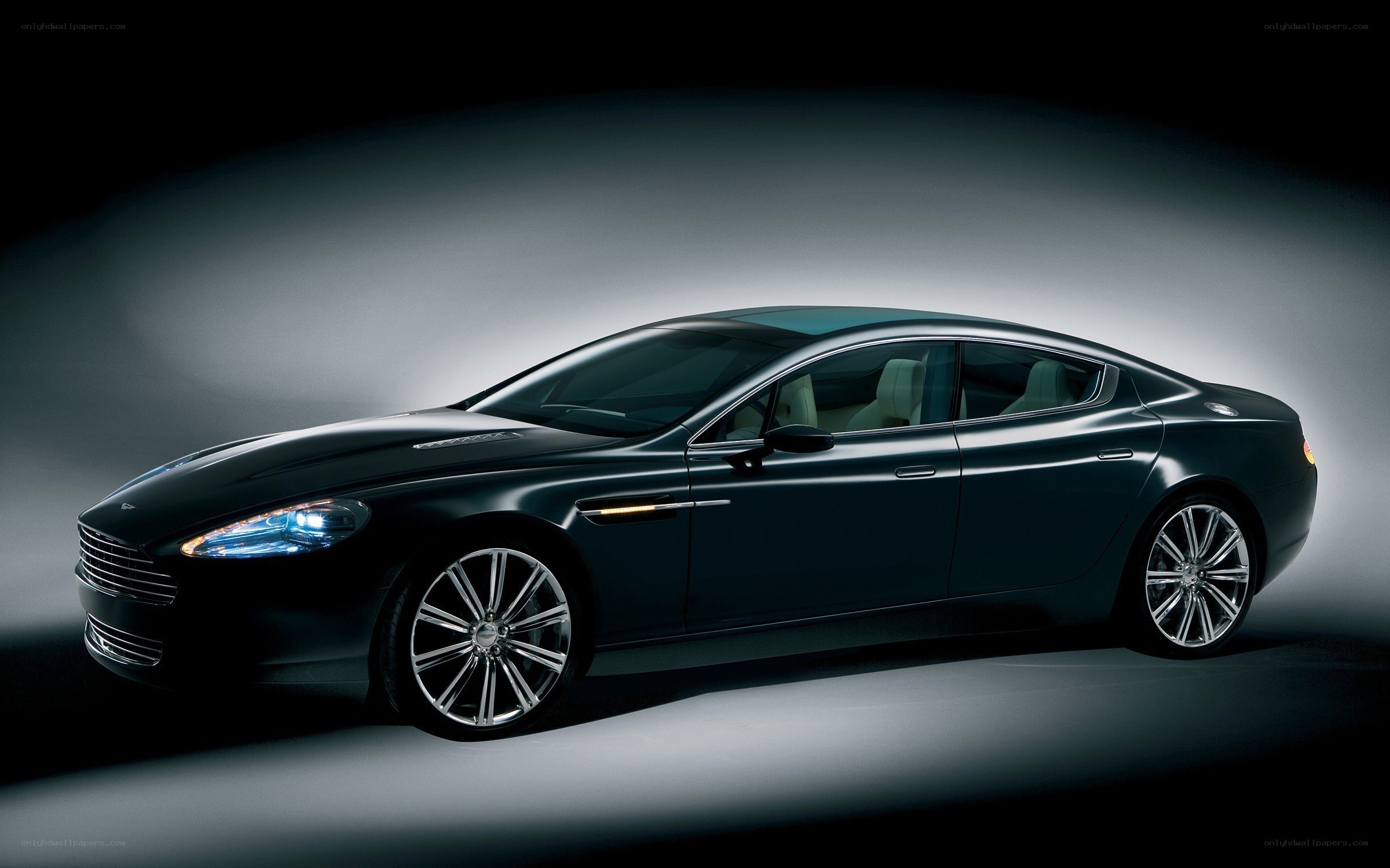 black luxury sedan in studio