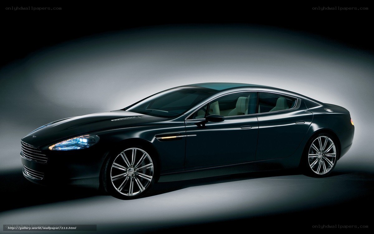 Black luxury sedan in studio