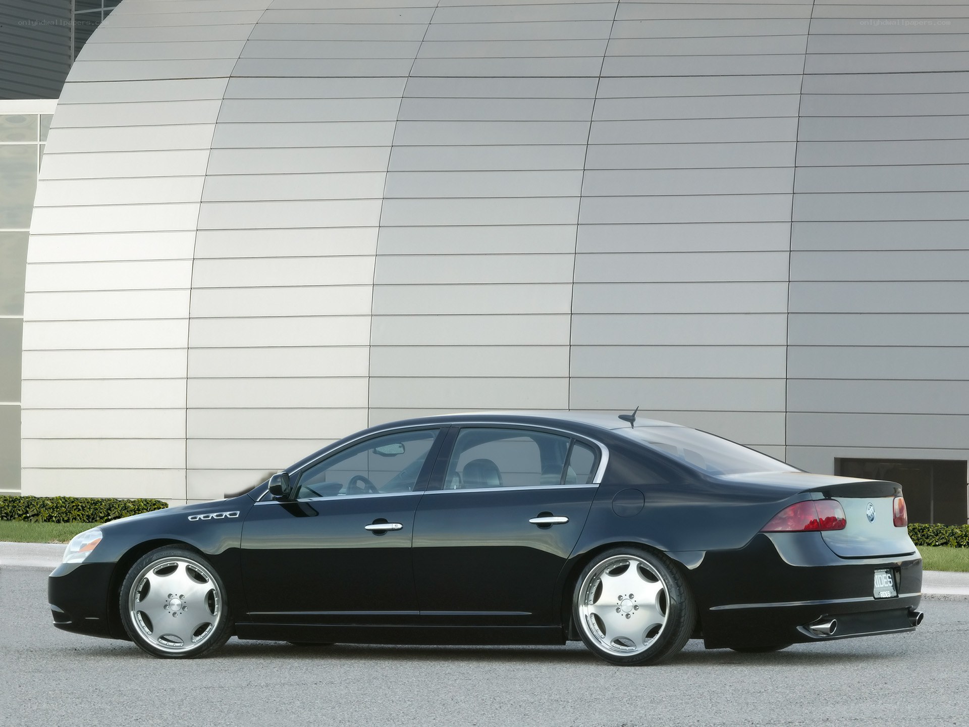 black luxury sedan parked