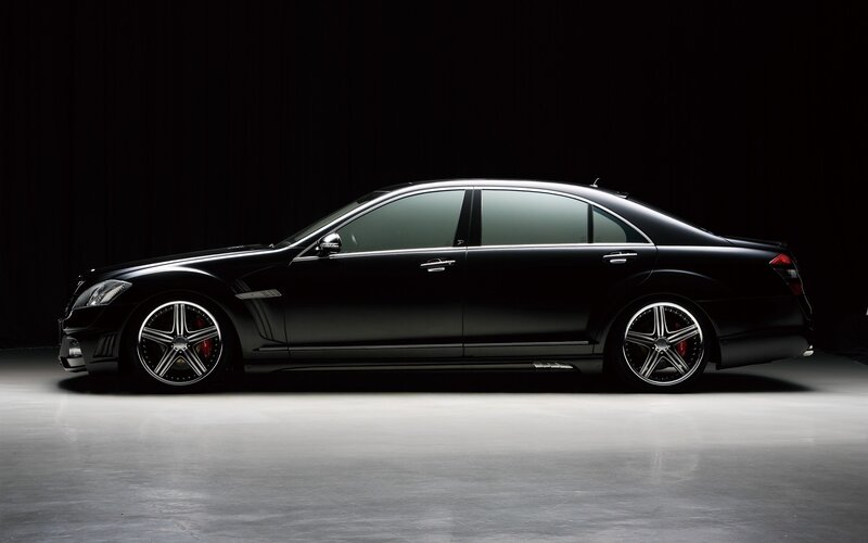 black luxury sedan side profile