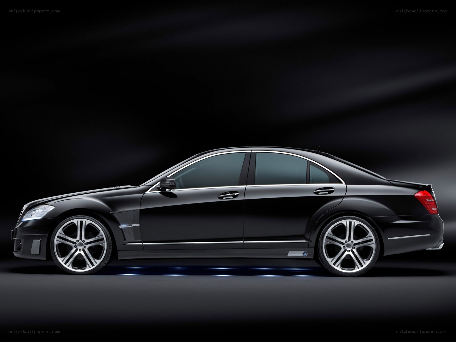 black luxury sedan side profile