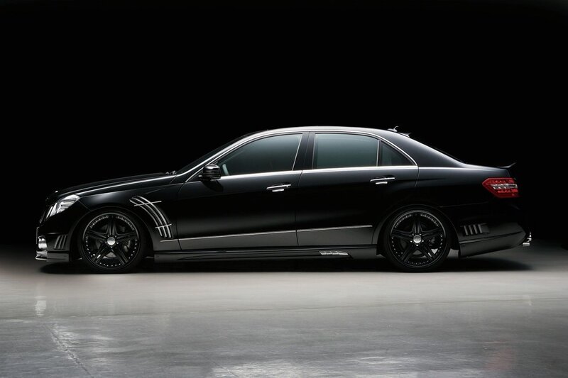 black luxury sedan side profile
