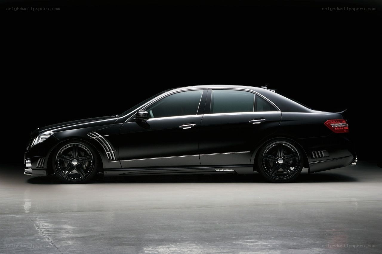black luxury sedan side profile