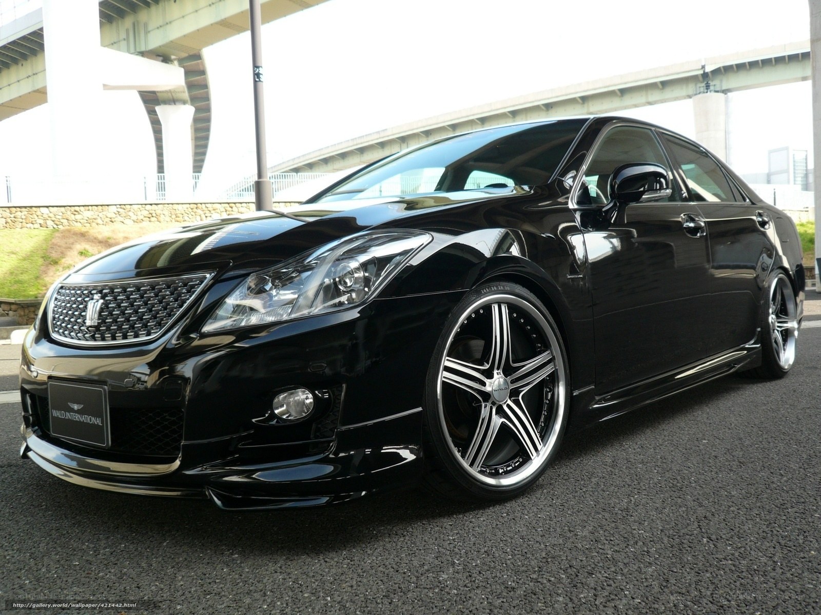Black luxury sedan with custom wheels