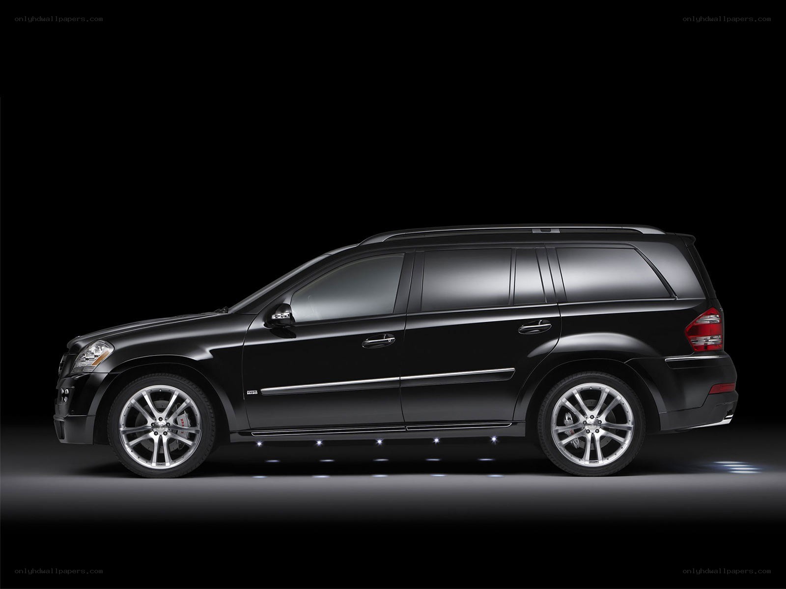 black luxury suv side profile