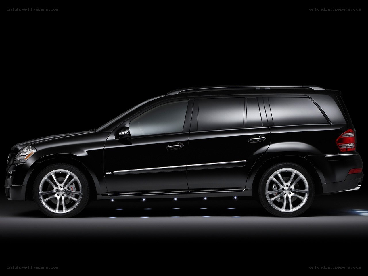 black luxury suv side profile